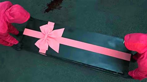 squid game coffin|Why are the coffins gift.